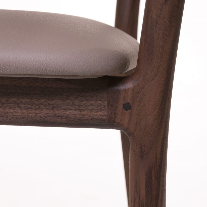 DUET CHAIR SHOWN IN DANISH OILED WALNUT AND LEATHER